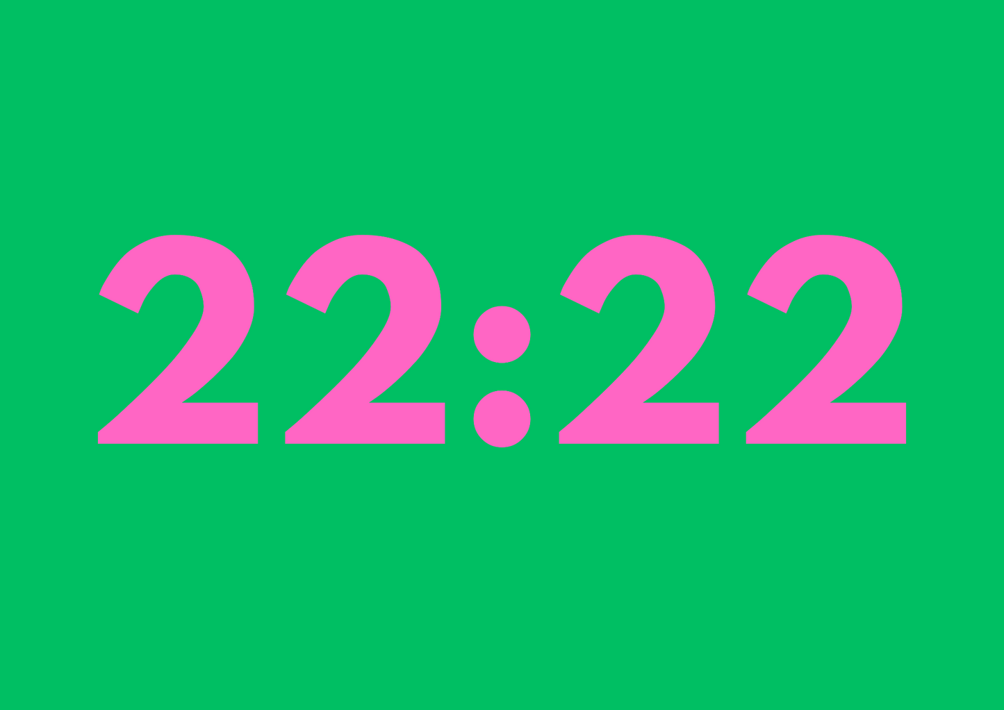 Pink '22:22' text on a green background angel time
