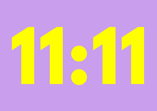 Yellow angel time '11:11' text on a purple background