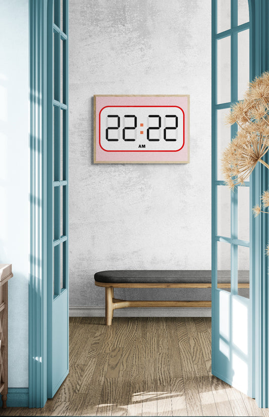 Digital clock displaying the time 22:22 angel time in a room with a bench and decorative elements.