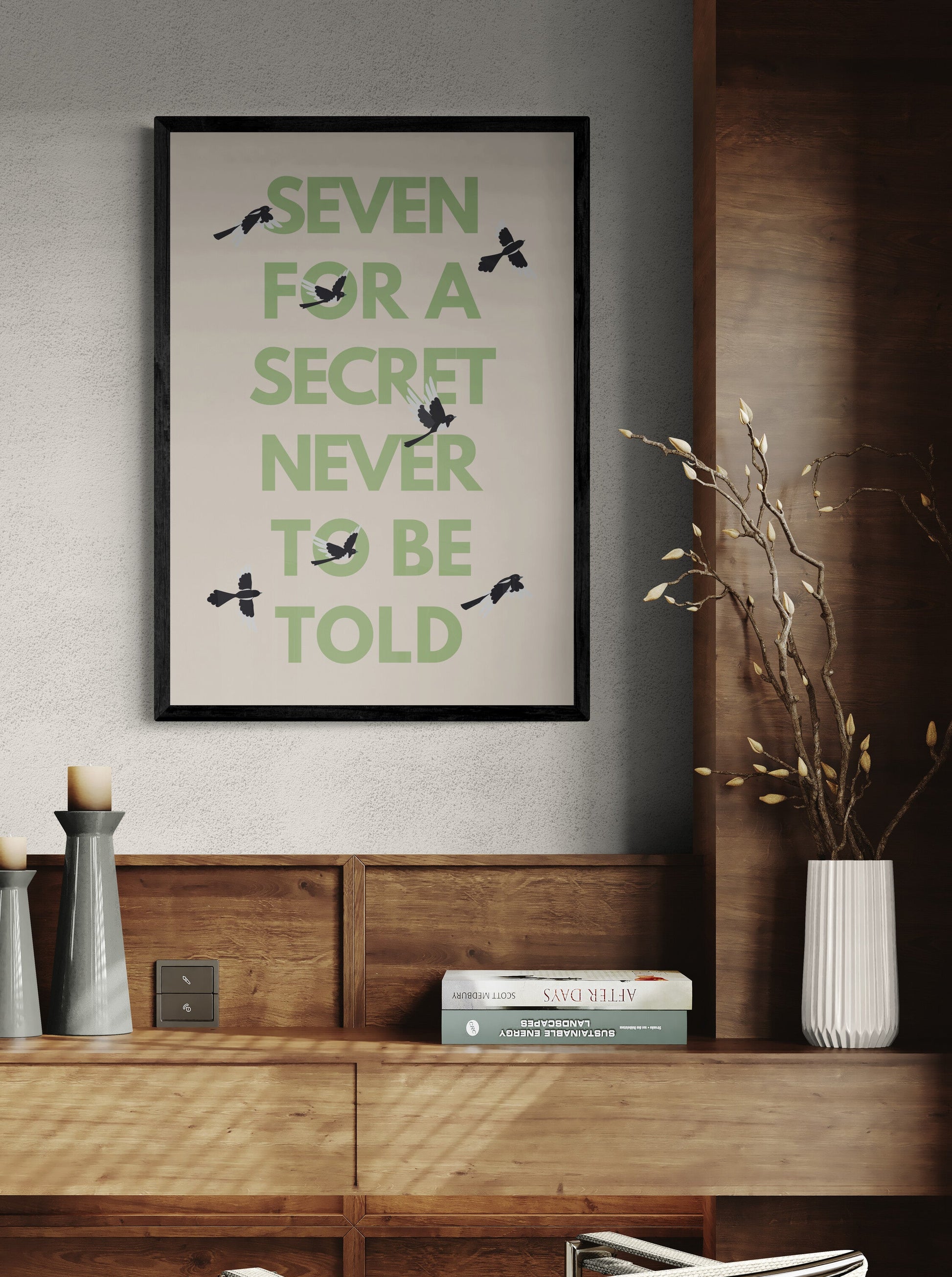 Room interior with a desk, chair, and framed quote from the magpie rhyme on the wall "seven for a secret never to be told".